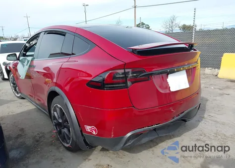 2023 Tesla Model X Dual Motor All-Wheel Drive/Standard Range z USA, uszkodzony, nr VIN 7SAXCBE50PF405571